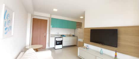 Family Apartment, Courtyard View, Beachside | Living area | 32-inch Smart TV with satellite channels, TV