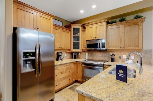 Homey ski-in/out condo with private hot tub & entertainment