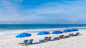 On the beach, sun loungers
