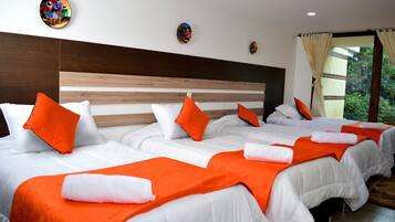 Superior Quadruple Room | Desk, blackout curtains, bed sheets