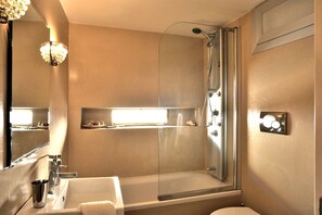 Hair dryer, towels, soap, shampoo