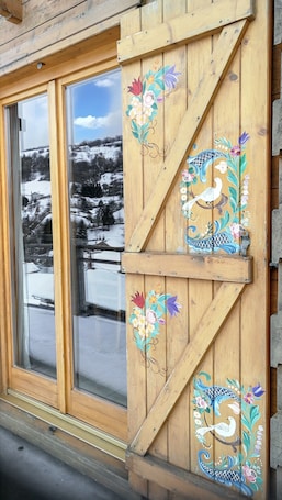 Exterior detail. Homerez - Charming Chalet in La Bresse with Terrace and Enclosed Garden