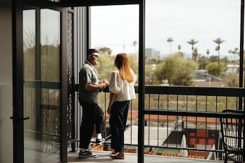 Poolside Balcony | Terrace/patio at Rise Uptown Hotel 