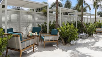 Outdoor pool, open 9:00 AM to 10:00 PM, pool loungers