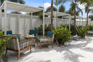 Outdoor pool, open 9:00 AM to 10:00 PM, sun loungers