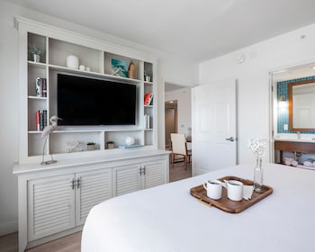 Premium bedding, blackout drapes, iron/ironing board, rollaway beds at Compass Hotel by Margaritaville Anna Maria Sound