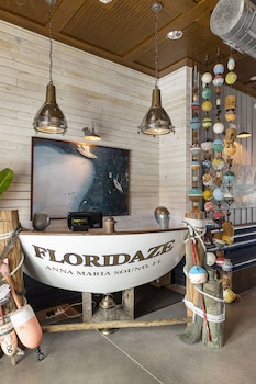 Lunch and dinner served, pool views at Compass Hotel by Margaritaville Anna Maria Sound