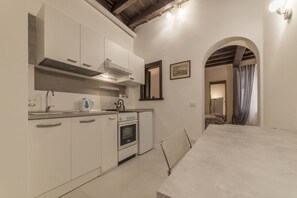 Fridge, oven, electric kettle, toaster