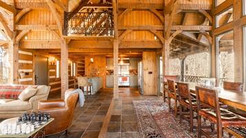 House (Brevard Luxury Cabin) | Living room | Flat-screen TV, ping pong