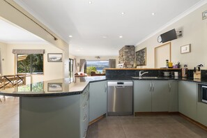Family House | Private kitchen | Full-size fridge, microwave, oven, stovetop - Riverstone (Lake Tarawera)