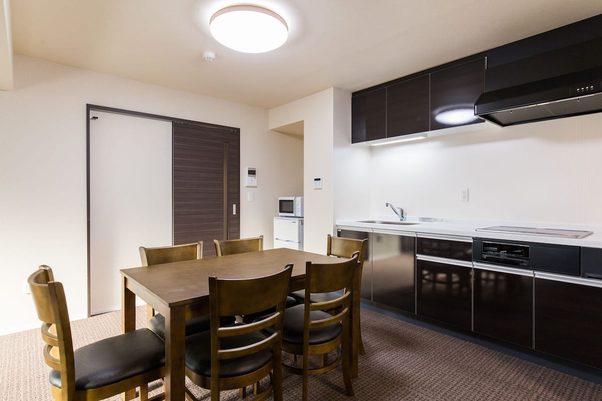 deluxe apartment | living area | flat-screen tv