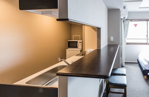 Superior Twin Room | Living area | Flat-screen TV - RAKU Hotel (Kyoto)