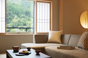 Japanese-Style Room TA3, for 3 Guests | Living area | Flat-screen TV - Hoshino Resorts KAI Nagato (Nagato)