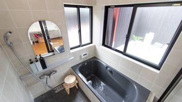 Private Vacation Home | Bathroom | Separate bathtub and shower, free toiletries, hair dryer, slippers