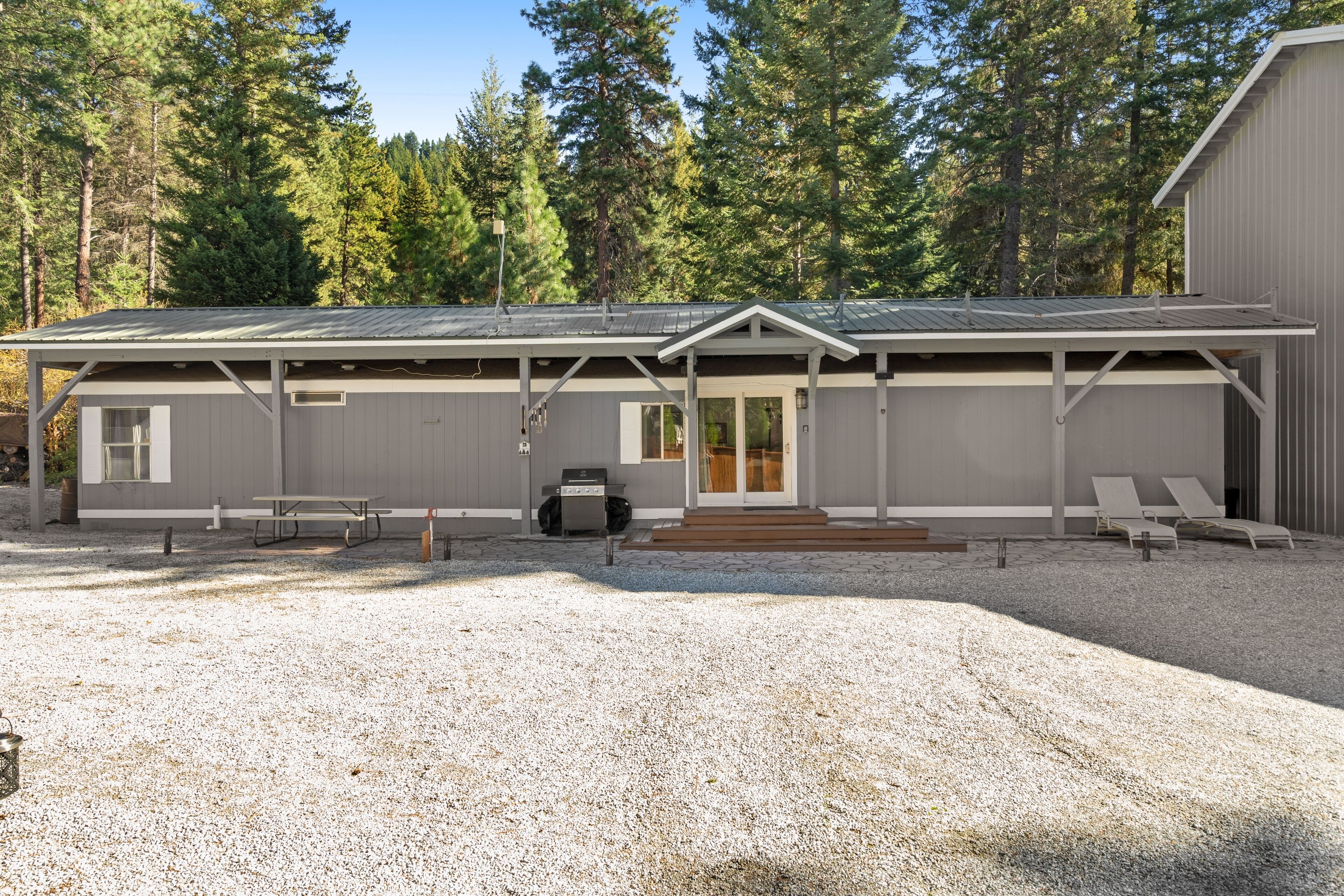 Welcoming home with deck, river access, firepit & covered parking - near park