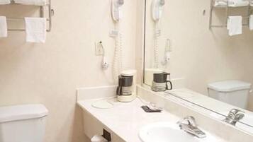 Combined shower/tub, deep soaking tub, free toiletries, hair dryer