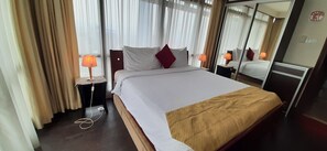 Family Apartment, 2 Bedrooms | Desk, blackout drapes, iron/ironing board, free WiFi