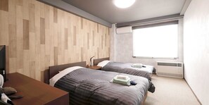 Cubrecamas, caja de seguridad en la habitación y cortinas blackout 