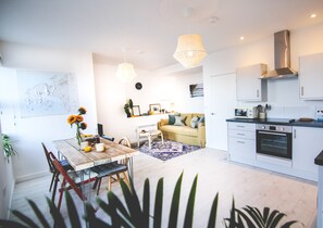 Apartment | Living area | Plasma TV - Luxury Sunrise Suite with Harbour Views (St Ives)