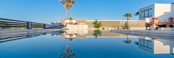 Outdoor pool, pool umbrellas, pool loungers