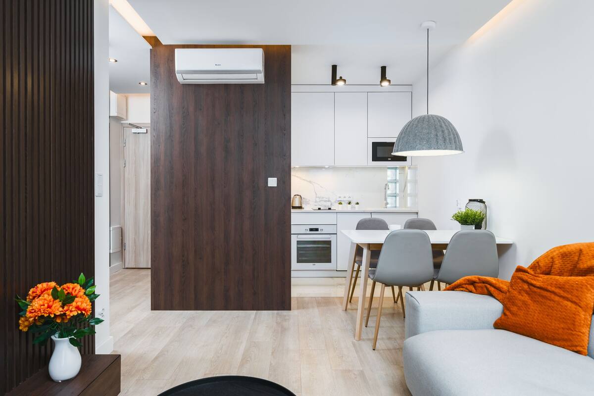 Suite Comfort | Area soggiorno | TV a schermo piatto