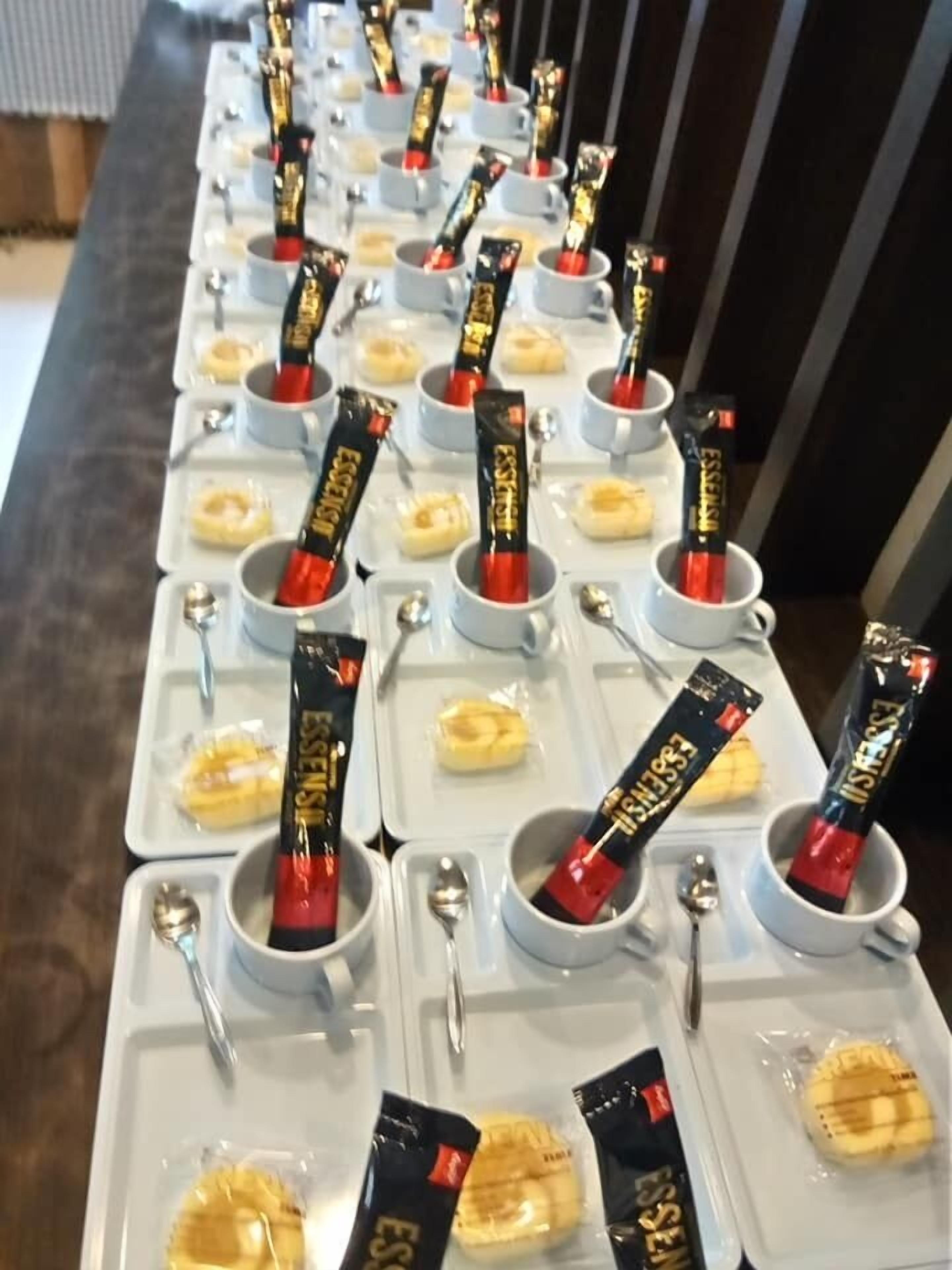 Trays with food items and Essene chocolate bars.