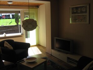 Apartment, Terrace | Living area | Flat-screen TV - Ferienwohnungen an der Loipe (Braunlage)