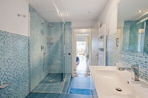 Shower, hair dryer, bidet, toilet paper