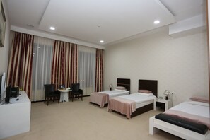 Superior Triple Room | Minibar, in-room safe, desk, laptop workspace - Ambassador Hotel (Baku)