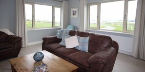 Cottage | Living room | LCD TV - Mannin Bay Beach House (Ballyconneely)