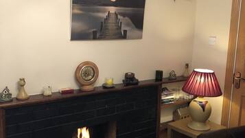 Ferienhaus | Wohnzimmer | LCD-Fernseher, Kamin