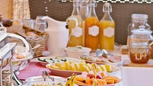 A buffet table with various food items and beverages. -  Residenze Argileto (Rome)