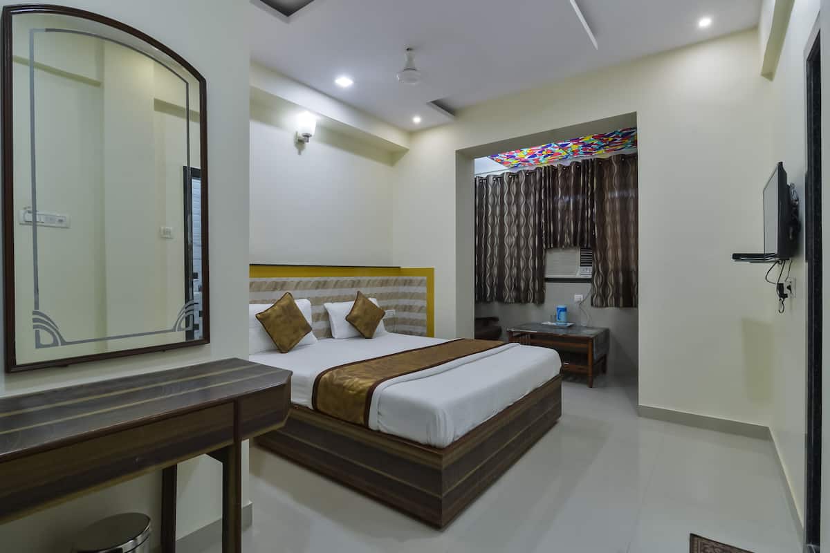 Suite Room | Blackout drapes, WiFi (free), individually decorated