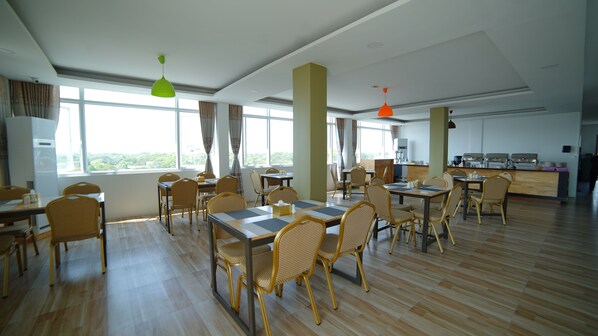 Breakfast, lunch, dinner served; local cuisine 