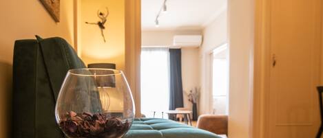 Apartment, 4 Bedrooms | Living area | Flat-screen TV