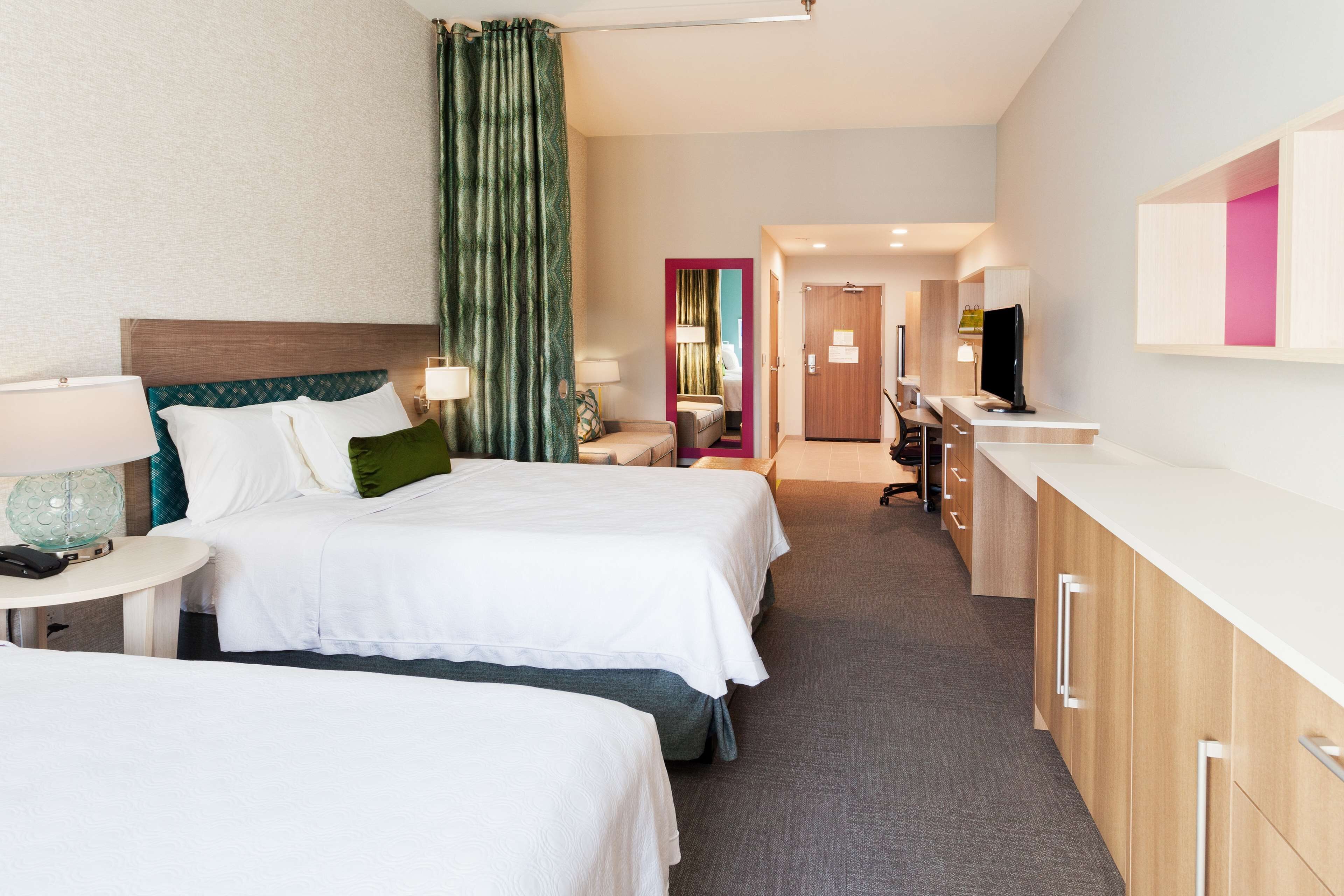 premium bedding, desk, laptop workspace, blackout curtains