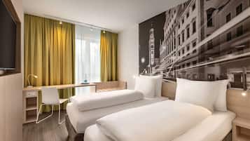 Hypo-allergenic bedding, in-room safe, desk, laptop workspace