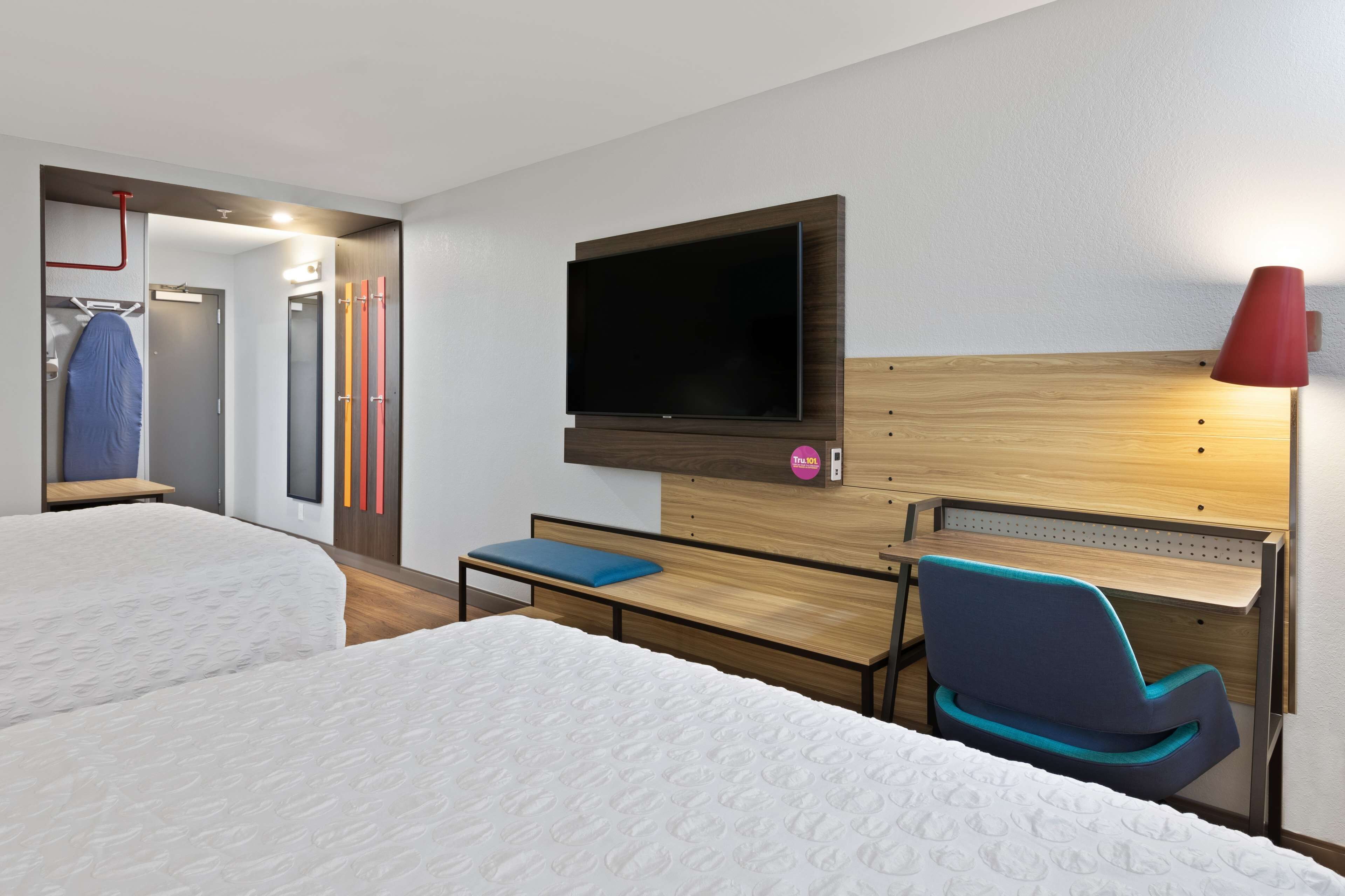 premium bedding, desk, laptop workspace, blackout curtains