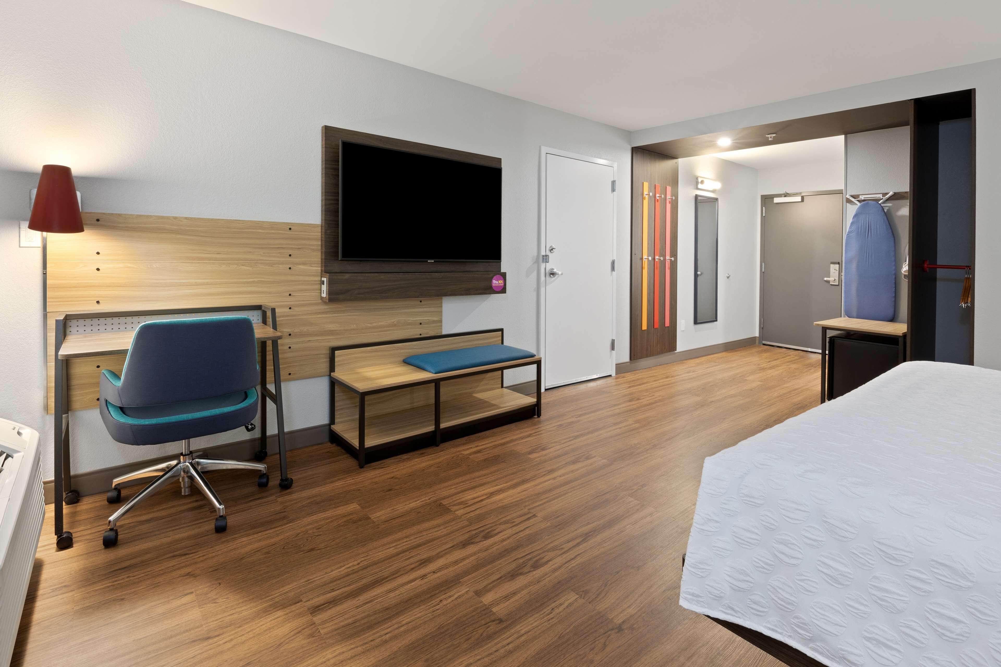 premium bedding, desk, laptop workspace, blackout curtains