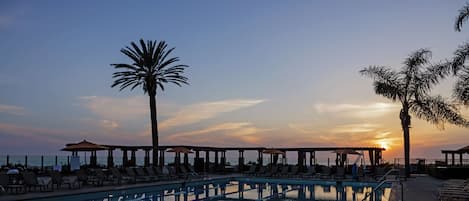 2 outdoor pools, open 8:00 AM to 9:00 PM, free cabanas, pool umbrellas