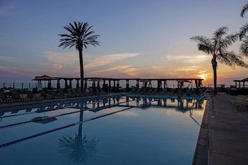 2 outdoor pools, open 8:00 AM to 9:00 PM, free cabanas, pool umbrellas