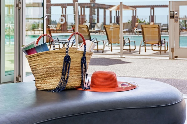 2 outdoor pools, open 8:00 AM to 9:00 PM, free cabanas, pool umbrellas