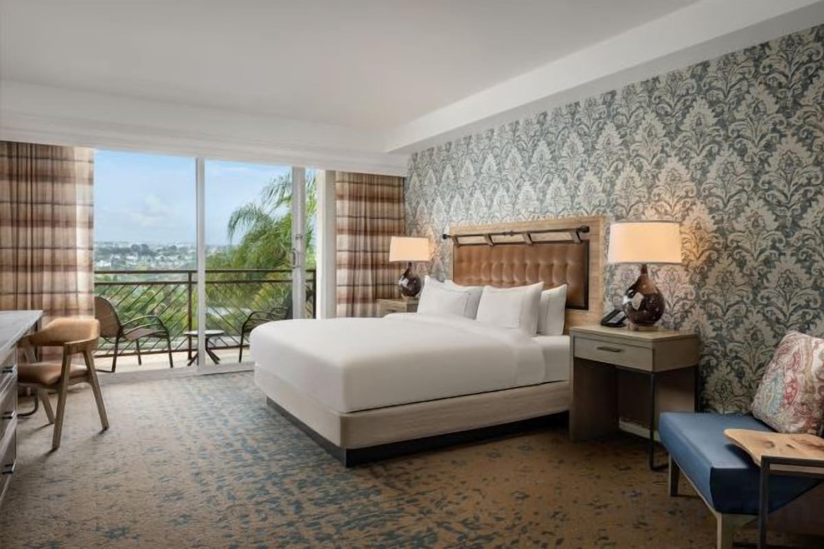 Hypo-allergenic bedding available, in-room safe, desk, laptop workspace