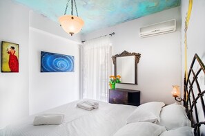 Apartamento, 1 habitación | 1 dormitorio y espacio para trabajar con un portátil