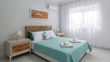 4 habitaciones, tabla de planchar con plancha y cuna de viaje