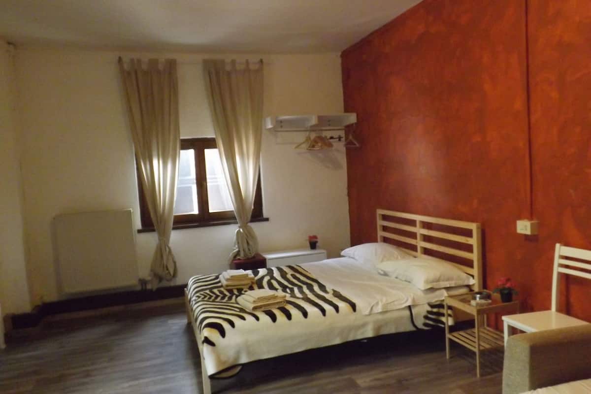 Chambre Quadruple Confort | Couette en duvet d'oie, draps fournis