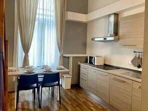 Apartment, 1 Bedroom | Private kitchen | Full-size fridge, microwave, stovetop, dishwasher - Casa Marsili (Turin)