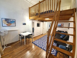 Apartment, 1 Bedroom | Living area | 32-inch flat-screen TV with digital channels, TV - Casa Marsili (Turin)