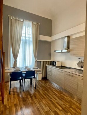 Apartment, 1 Bedroom | Private kitchen | Full-size fridge, microwave, stovetop, dishwasher - Casa Marsili (Turin)