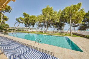 Outdoor pool, pool umbrellas, pool loungers